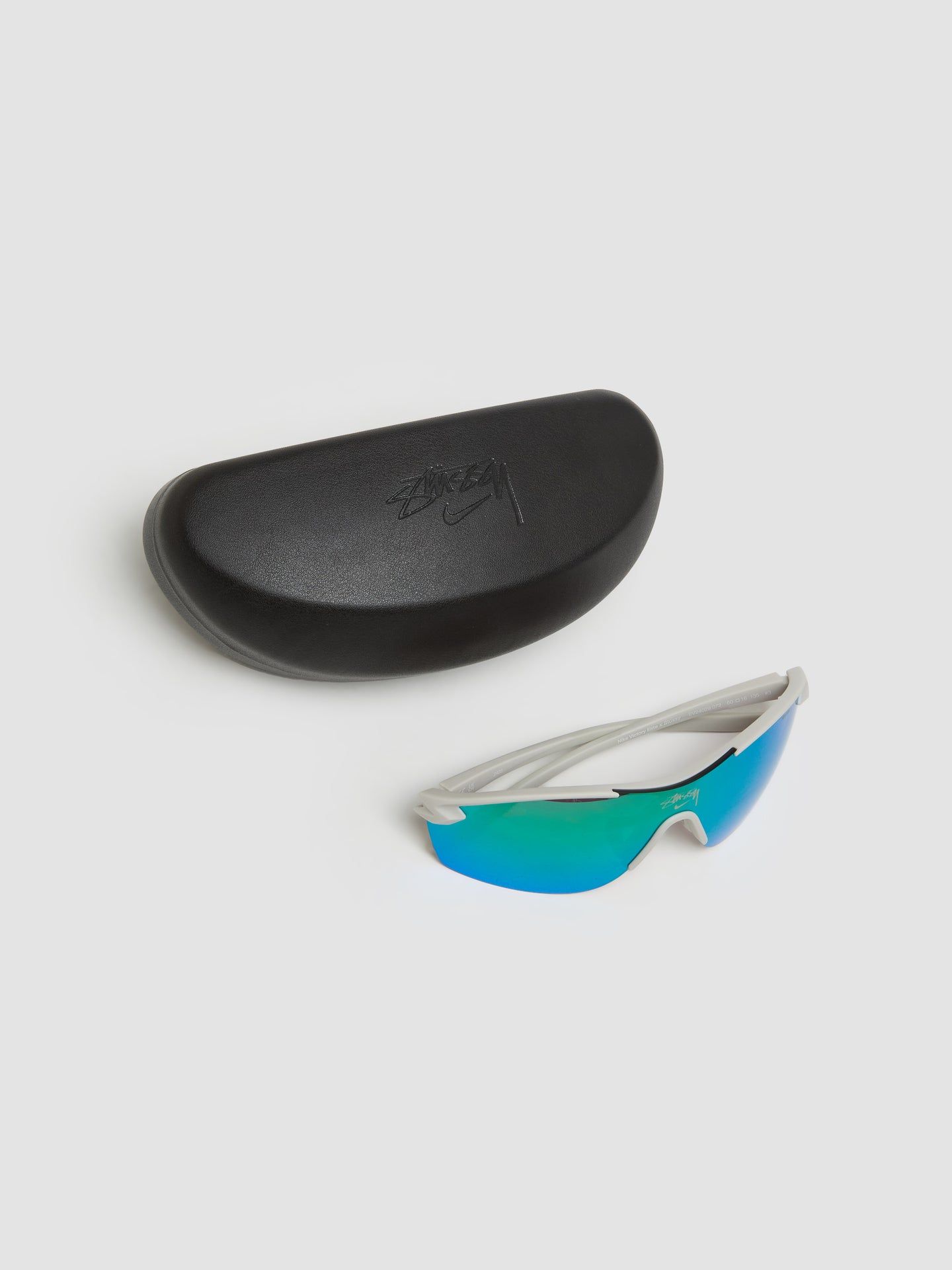 x Stüssy Victory Elite Sunglasses in Green Mirror