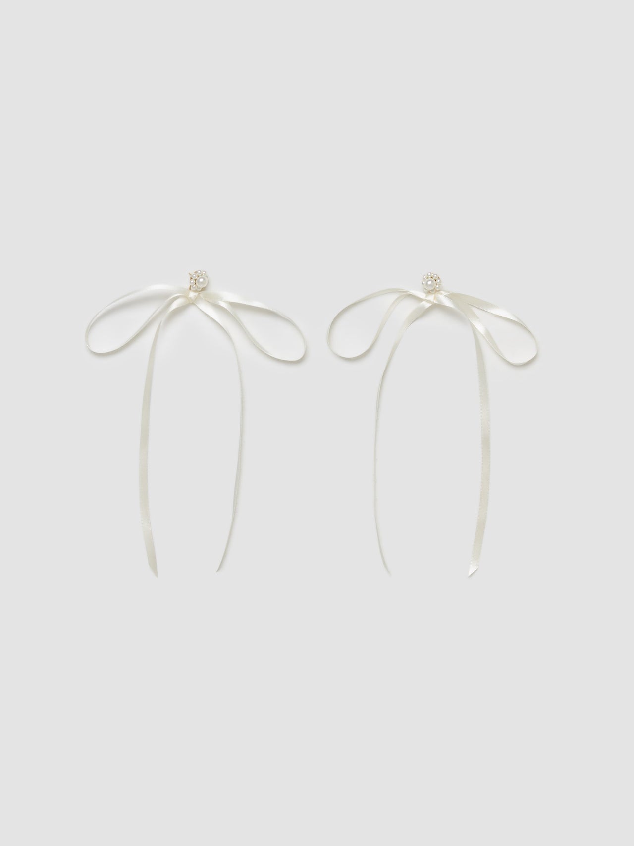 Bow Ribbon Stud Earrings in Pearl