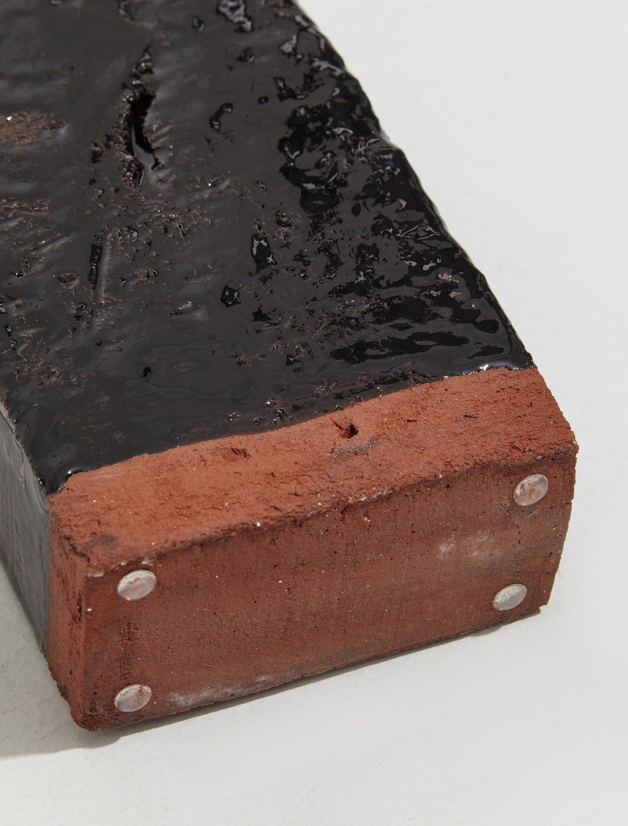 A Single Brick Candle Holder in Black