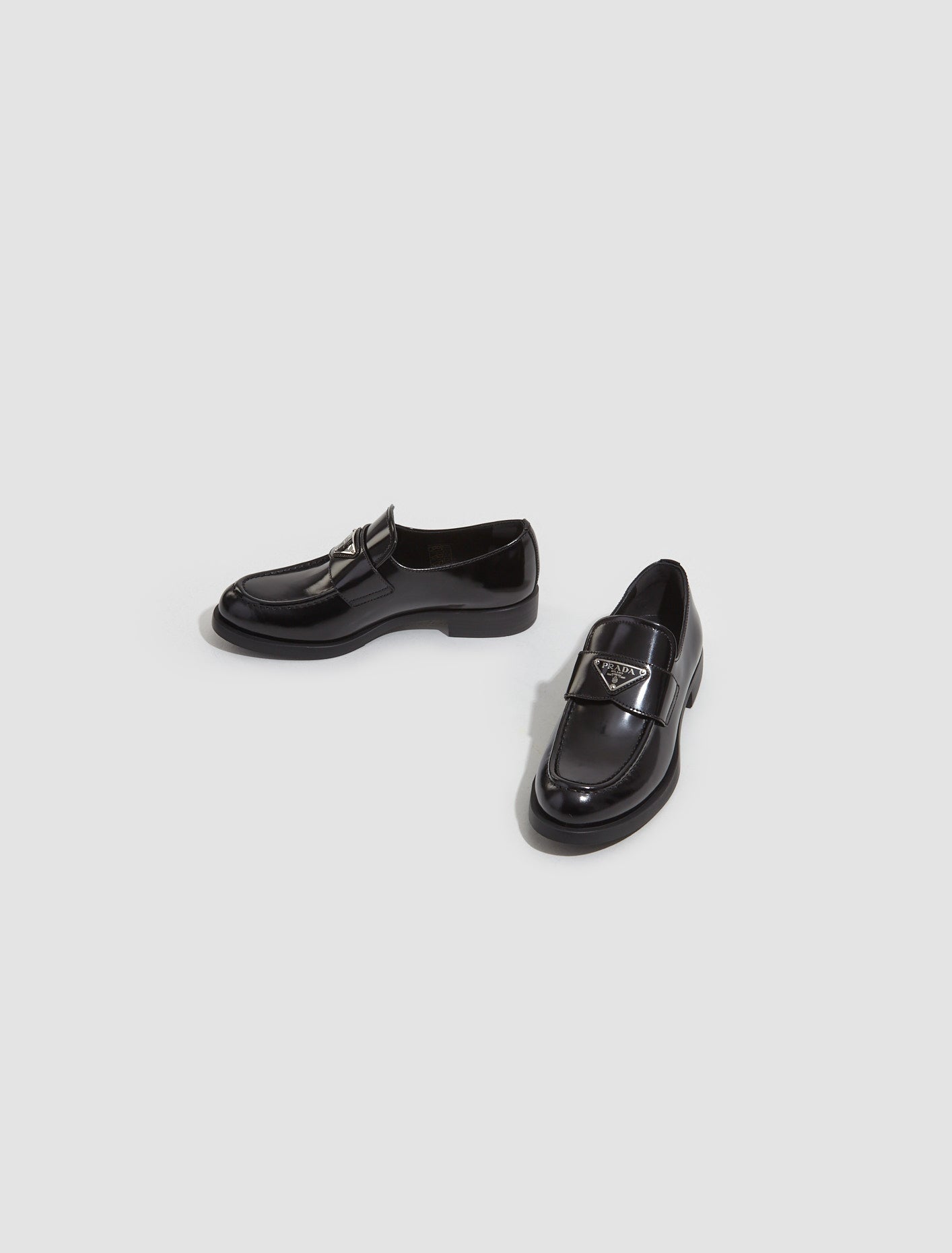 Prada Women's Brushed Leather Loafers with Logo in Black